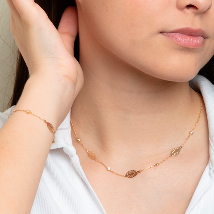 PULSERA DE HOJAS CALADAS Y CIRCONITAS