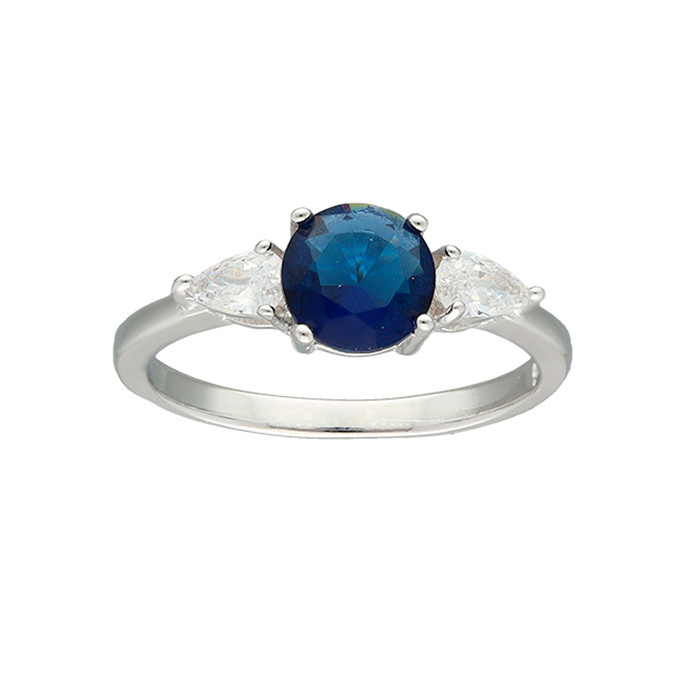 ANILLO EN PLATA CIRCONITA AZUL LATERALES BLANCAS