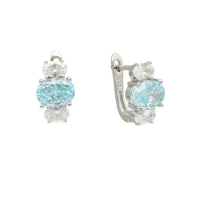 PENDIENTES EN PLATA CON TRES  CIRCONITAS AZUL Y BLANCAS OVAL