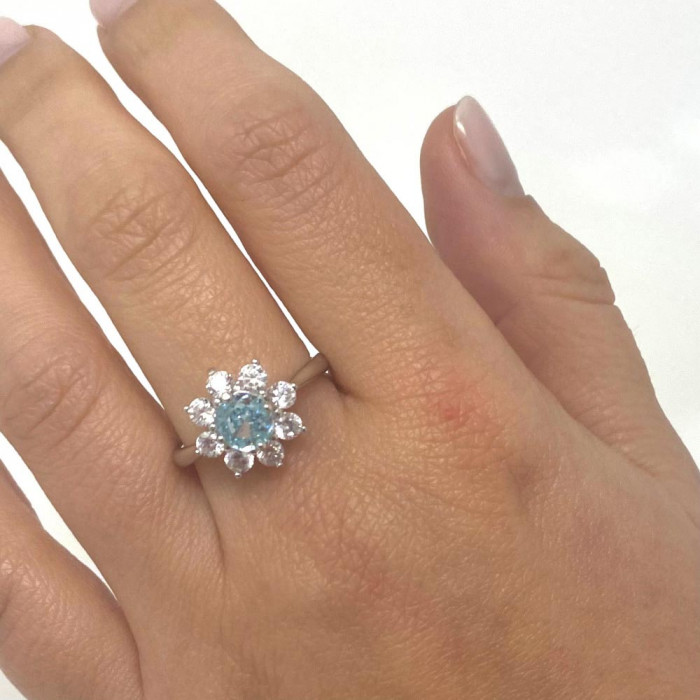 ANILLO EN PLATA CON CIRCONITA AZUL Y BLANCA FLOR 2