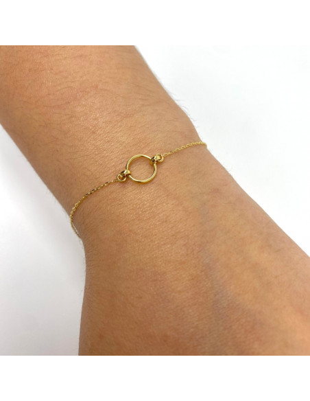 PULSERA EN ORO CON CÍRCULO CALADO