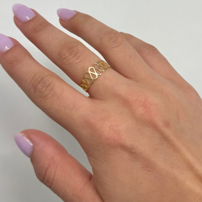 ANILLO EN ORO CON FORMA DE ONDAS CALADAS 2
