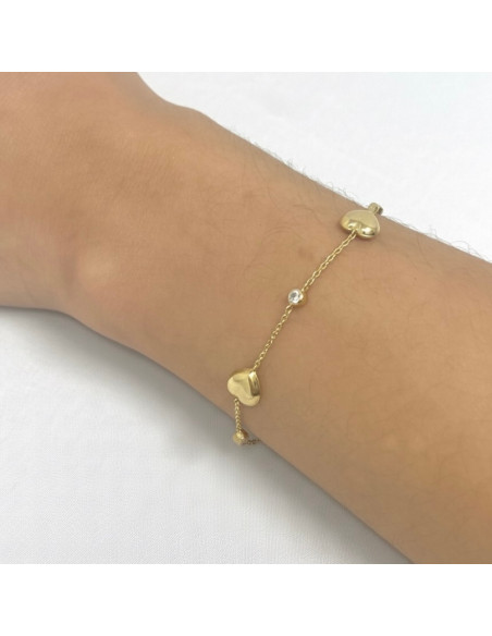 PULSERA EN ORO CON CORAZONES Y CIRCONITAS
