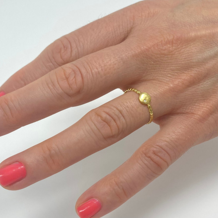 ANILLO EN ORO DE 18 QUILATES CON DIAMANTE 2