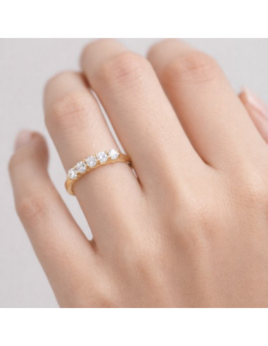 ANILLO EN ORO CON 5 CIRCONITAS MONTADAS EN GARRA