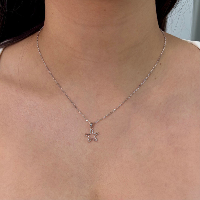 GARGANTILLA EN PLATA ESTRELLA CALADA. 2