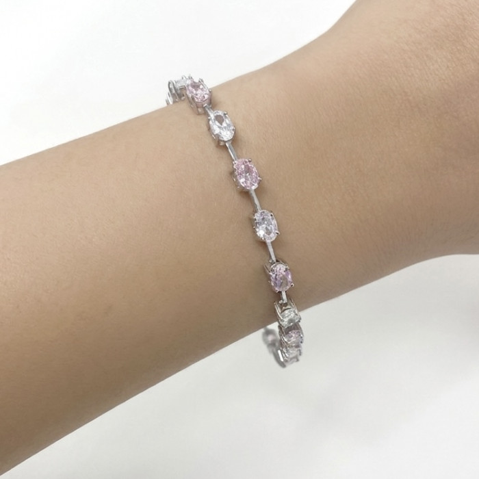 PULSERA RIVIERE CON PIEDRAS BLANCAS Y ROSAS 2