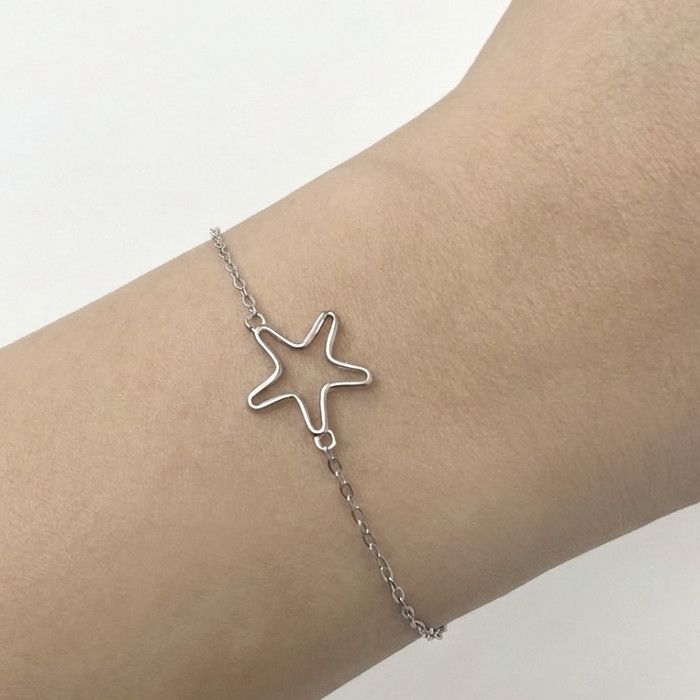 PULSERA EN PLATA FORMA DE ESTRELLA CALADA 2