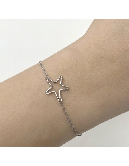 PULSERA EN PLATA FORMA DE ESTRELLA CALADA