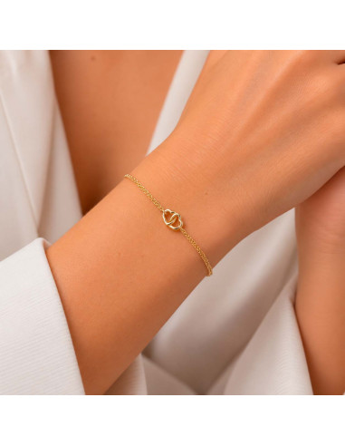 PULSERA EN PLATA DORADA CON FORMA DE CORAZONES CALADOS