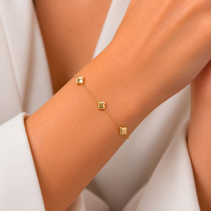 PULSERA EN PLATA DORADA CON FORMA DE FLORES 2