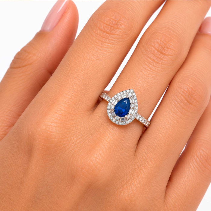 ANILLO EN PLATA CON CIRCONITAS DOBLES Y CENTRO AZUL FORMA GOTA 2