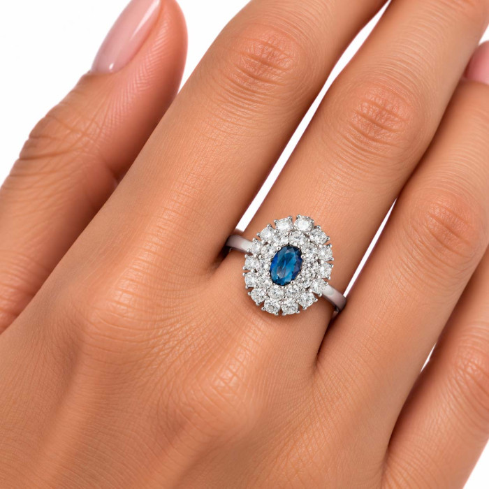 ANILLO EN PLATA CON CIRCONITAS Y CENTRO AZUL FORMA OVAL 2