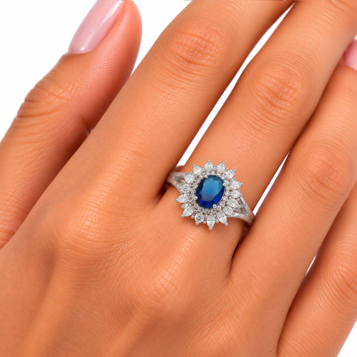 ANILLO PLATA CON CIRCONITAS Y CENTRO ROSETA AZUL OVAL 2